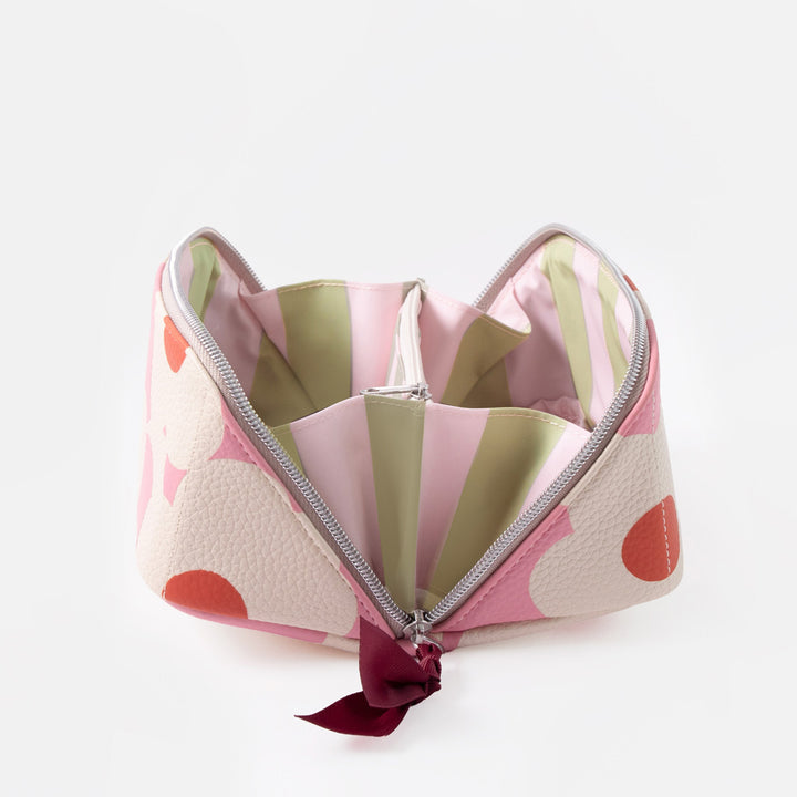 pink & white flower print flat lay wash bag open to show pink & green striped lining