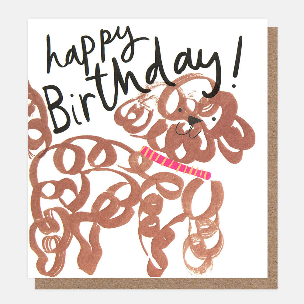 birthday card featuring a curly haired brown dog and 'happy birthday' message in black handwritten style lettering