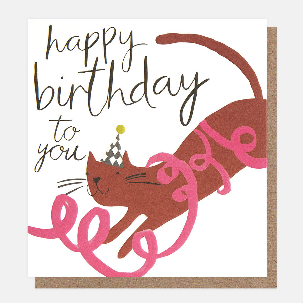 birthday card featuring a cat wrapped in curly ribbon and 'happy birthday to you' message in black handwritten style lettering
