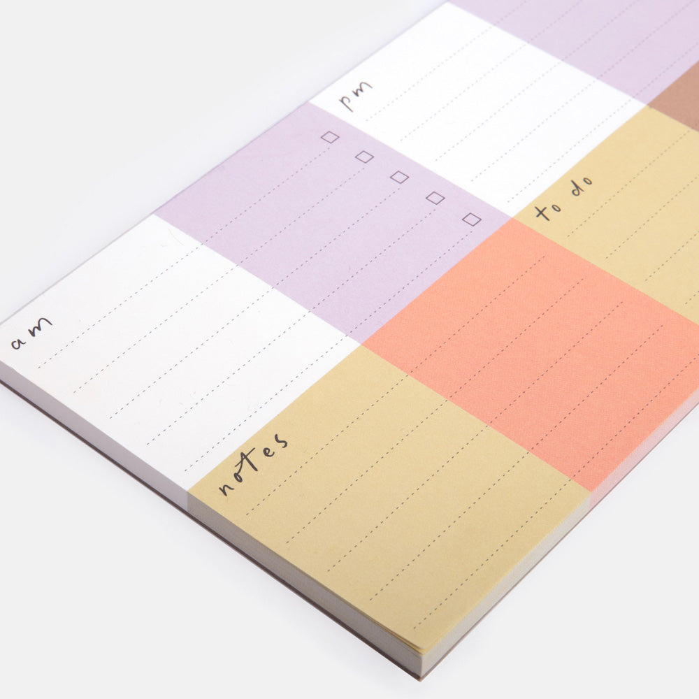 notepad with colourful check sections