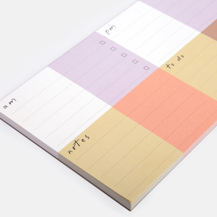 notepad with colourful check sections