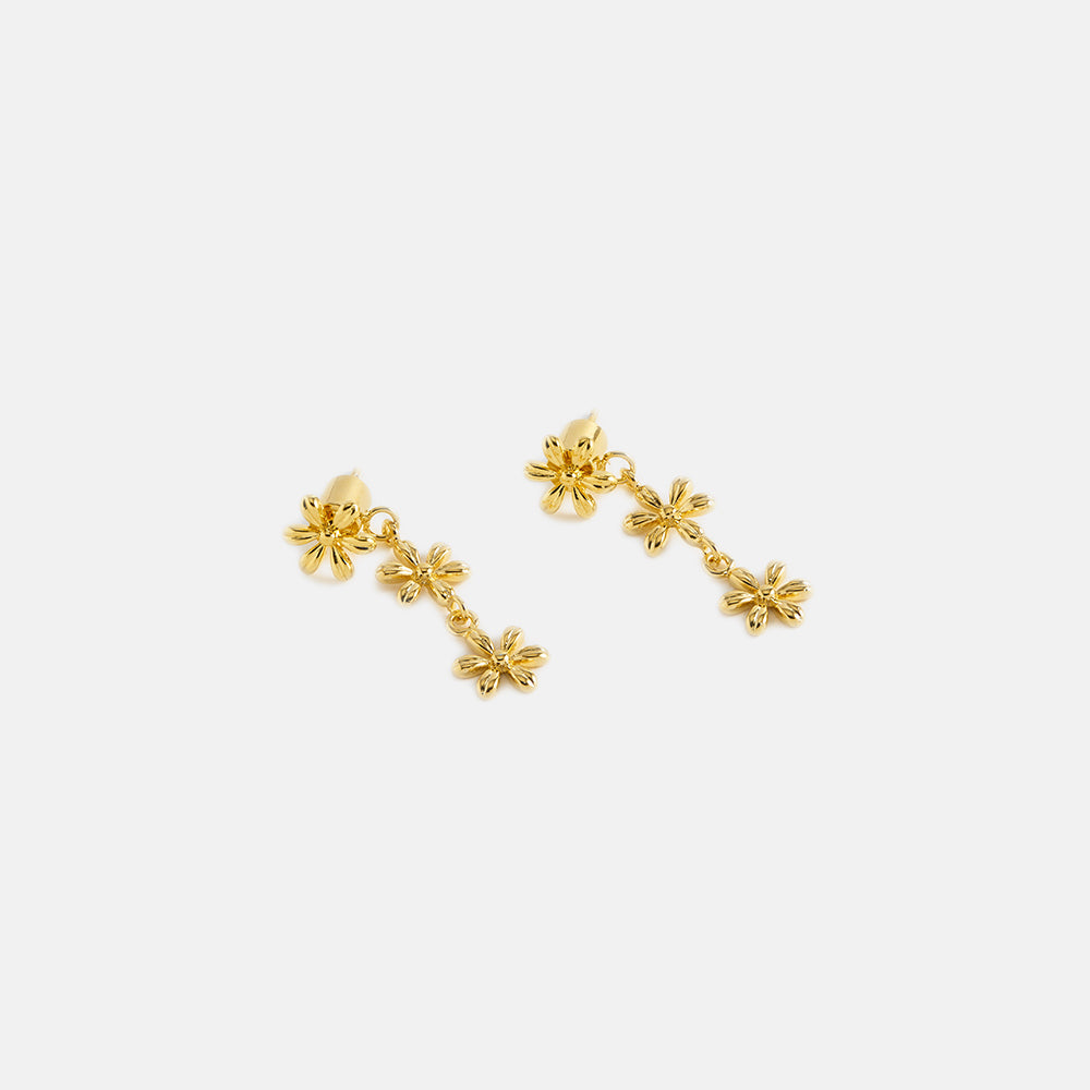 gold plated flower trio drop earrings by Estella Bartlett