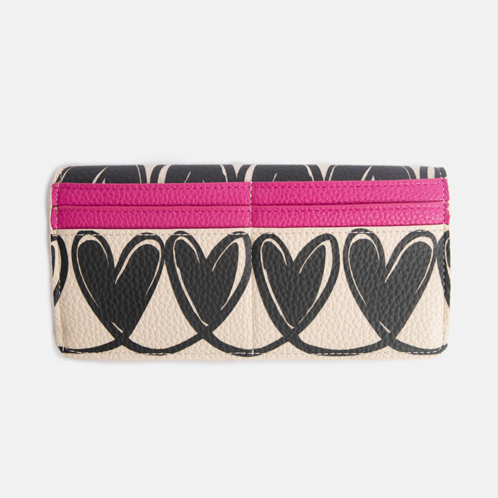 long envelope purse with monochrome looped hearts design and bright pink card slots