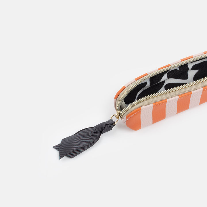 pink and orange stripe slim pencil case with black and gold hearts print lining