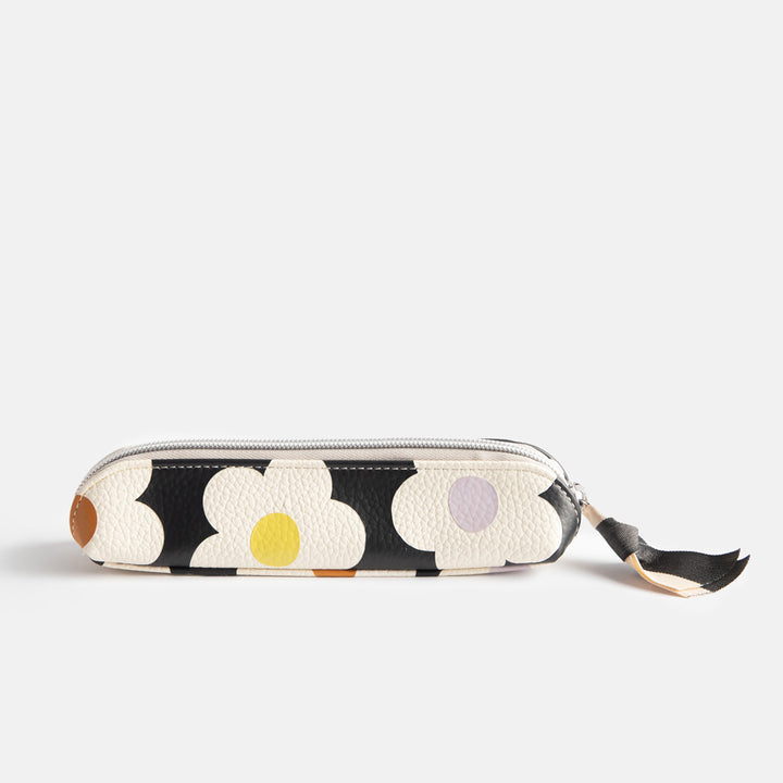 leather look PU slim pencil case in a cream flowers on charcoal background design with a black and white ribbon zip pull and grey striped lining