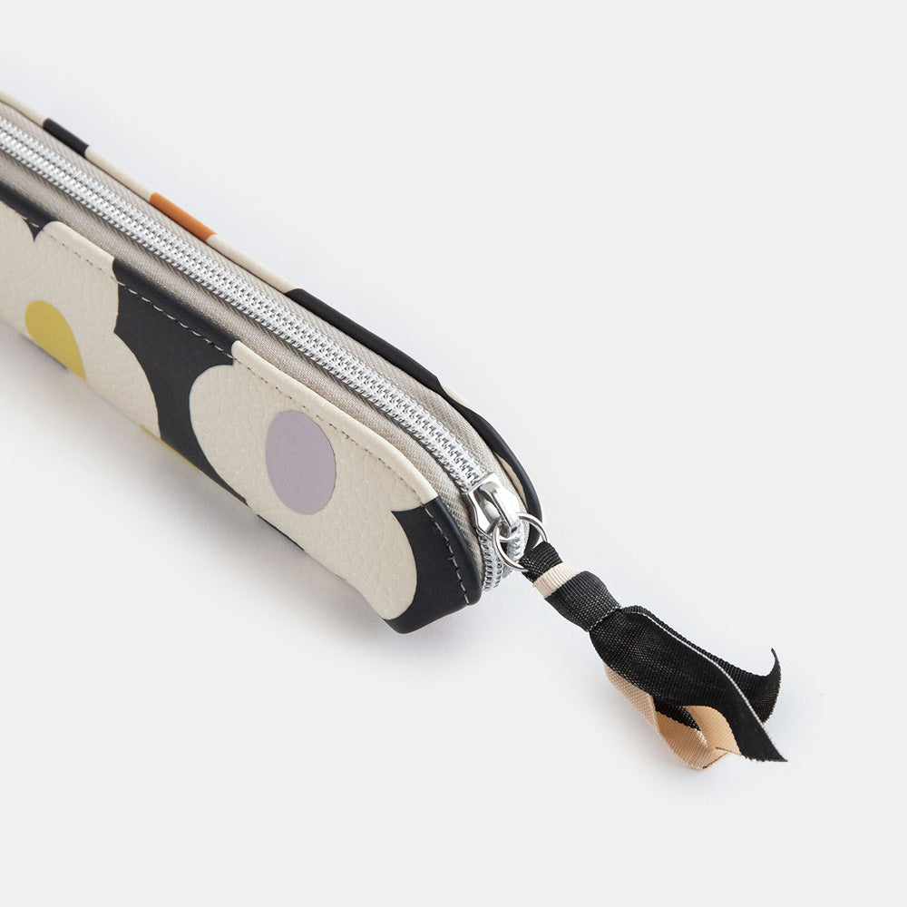 leather look PU slim pencil case in a cream flowers on charcoal background design with a black and white ribbon zip pull and grey striped lining