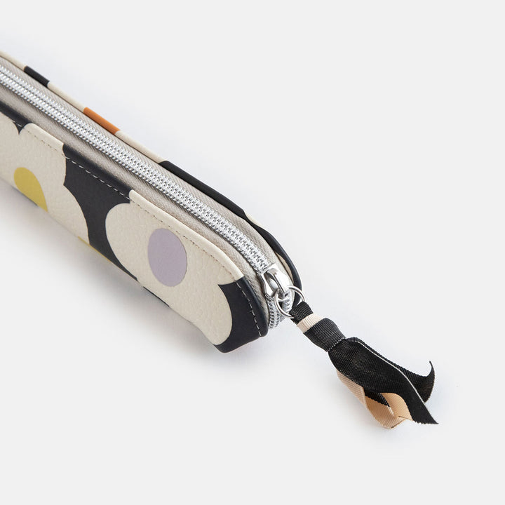 leather look PU slim pencil case in a cream flowers on charcoal background design with a black and white ribbon zip pull and grey striped lining