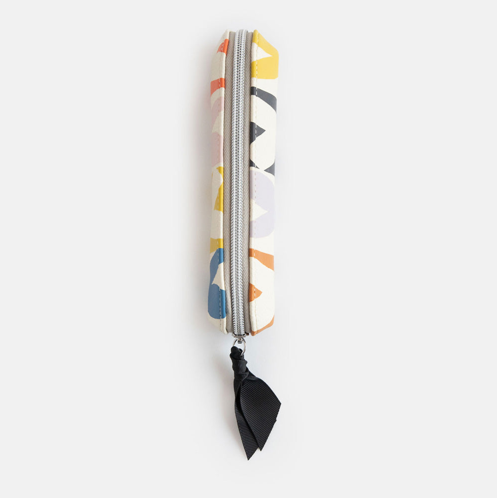 leather look PU slim pencil case in a multicolour hearts design with a black ribbon zip pull and pink striped lining