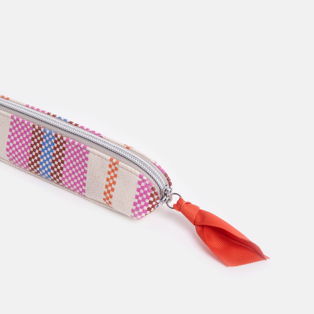 canvas pencil case with colourful checkerboard stripe design, silver zip and red zip pull 
