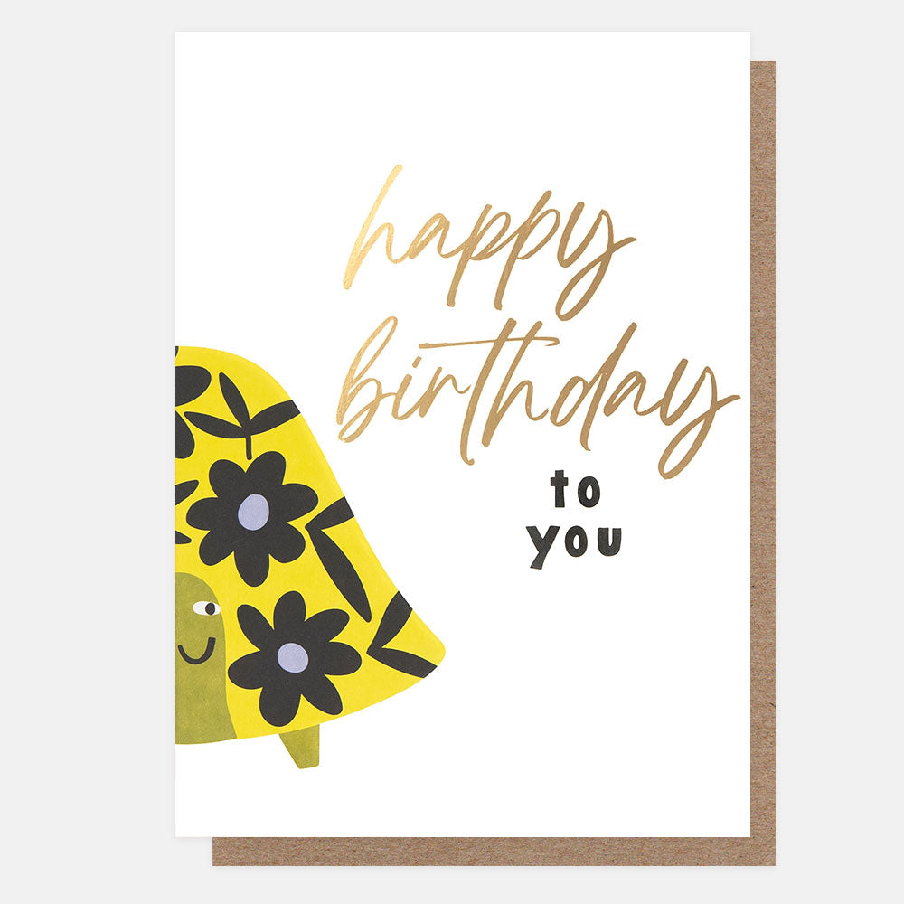 birthday card featuring a colourful turtle centered on the card fold and 'happy birthday to you" message
