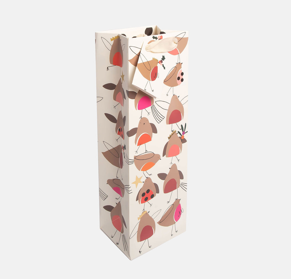 Gift bag with Christmassy robins pattern on a white background