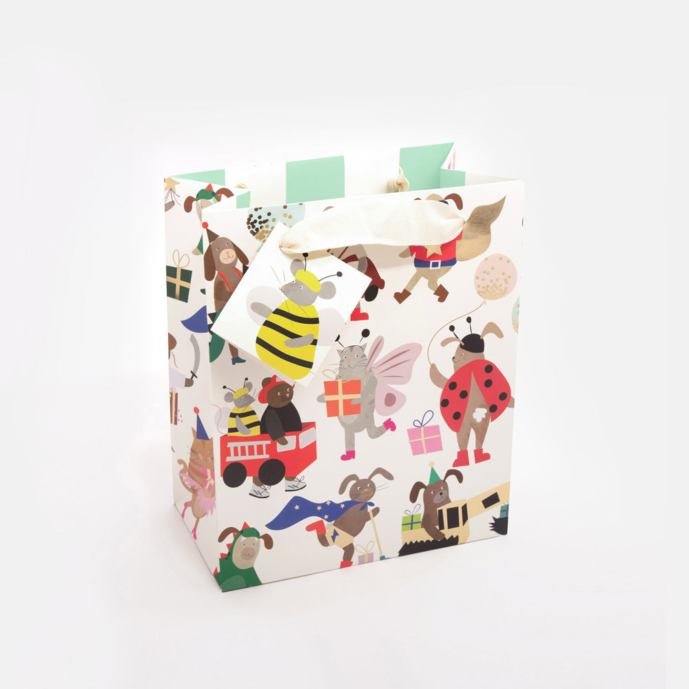 medium sized gift bag featuring a design of hand drawn animals dressed up in fancy dress