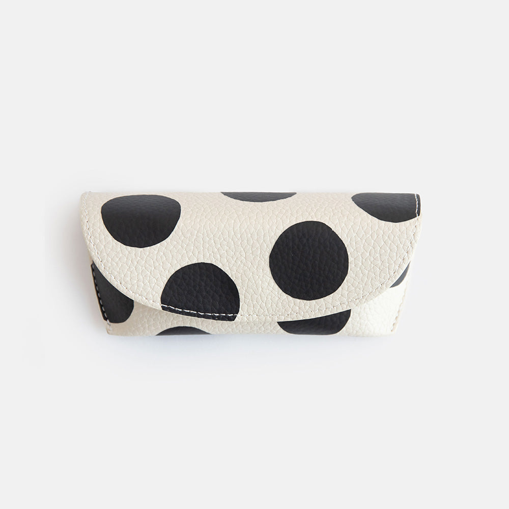 leather look PU flap close glasses case in monochrome spot print with suedette lining and hidden silver popper close