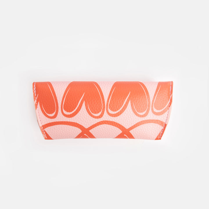 pink flap close glasses case with orange looped hearts design