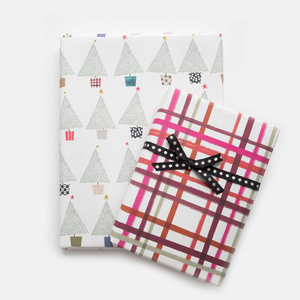 two gift wrapped presents in dotty trees with pots and stars design, and red & burgundy check design