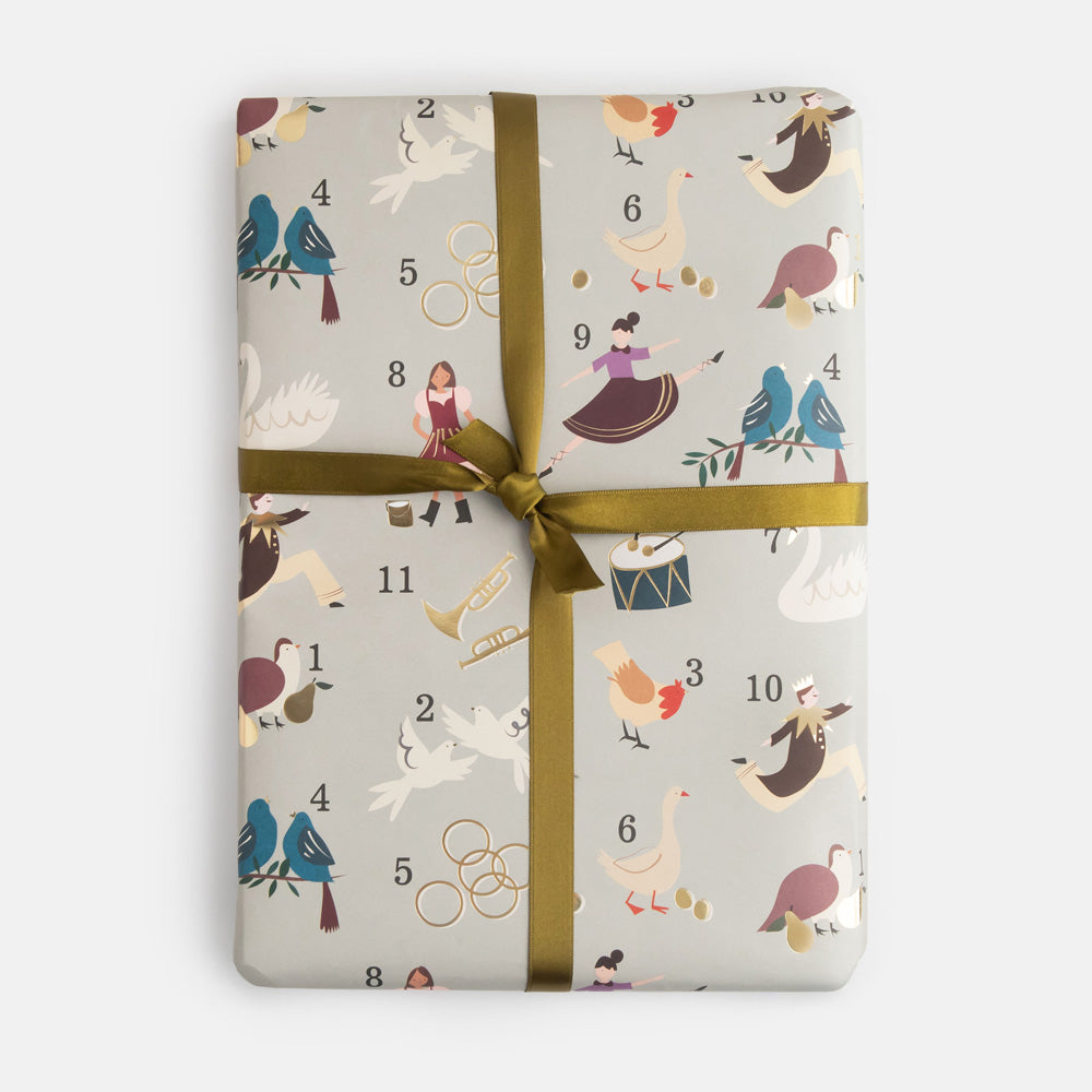 gift wrapped present with 12 days of Christmas design