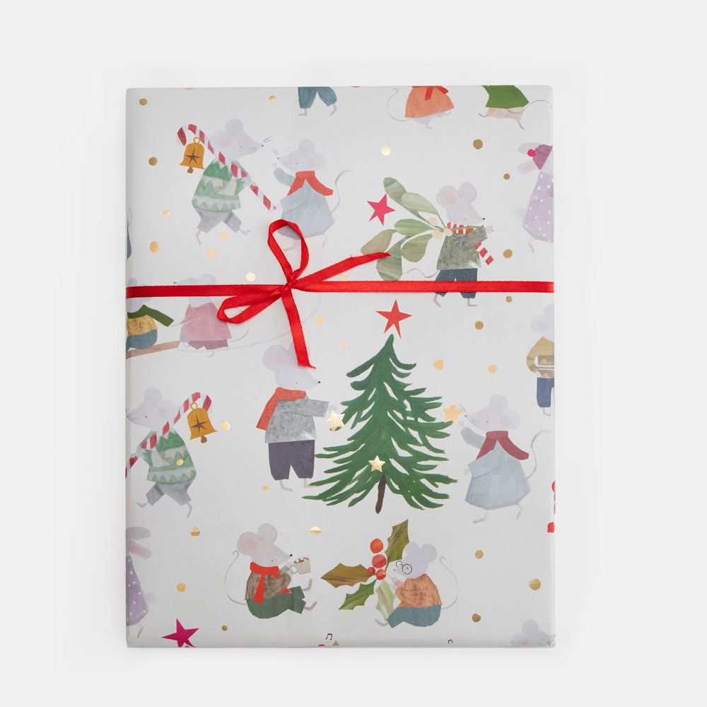 Christmas-themed gift wrap with cartoon mice characters and a red ribbon on a white background
