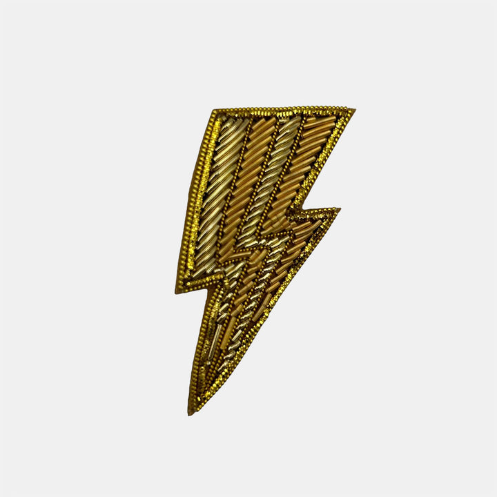 gold beaded lighting bolt brooch