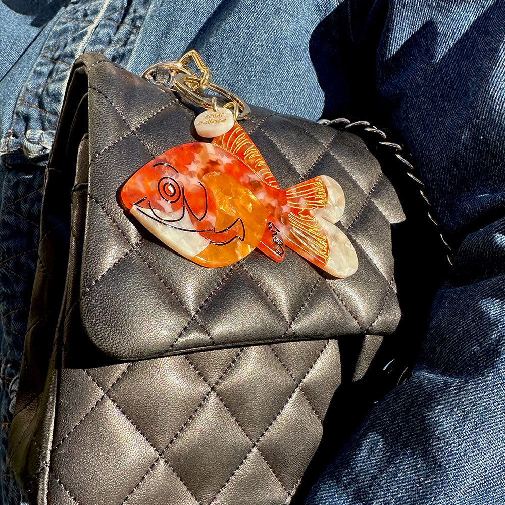 goldfish bag charm or keyring on black leather bag