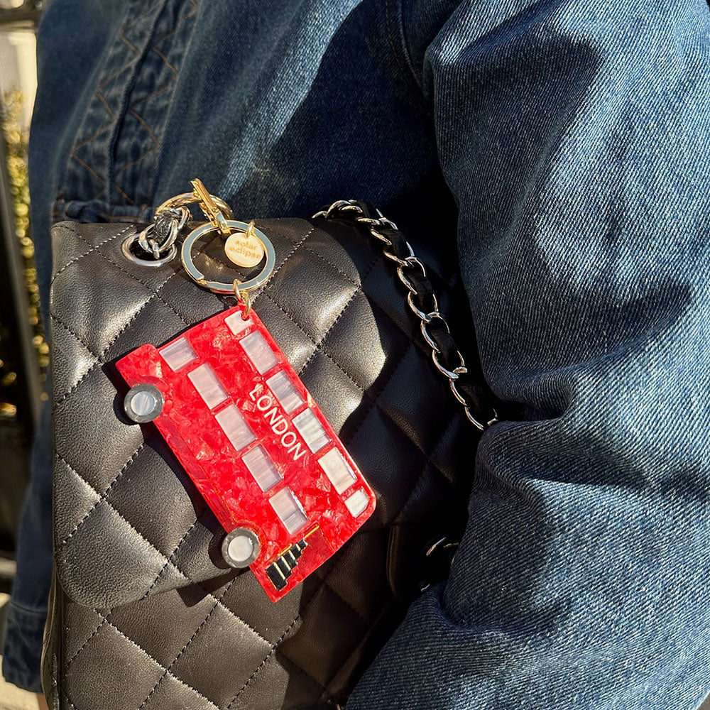 red London bus hand painted bag charm or keyring on a black quilted leather bag