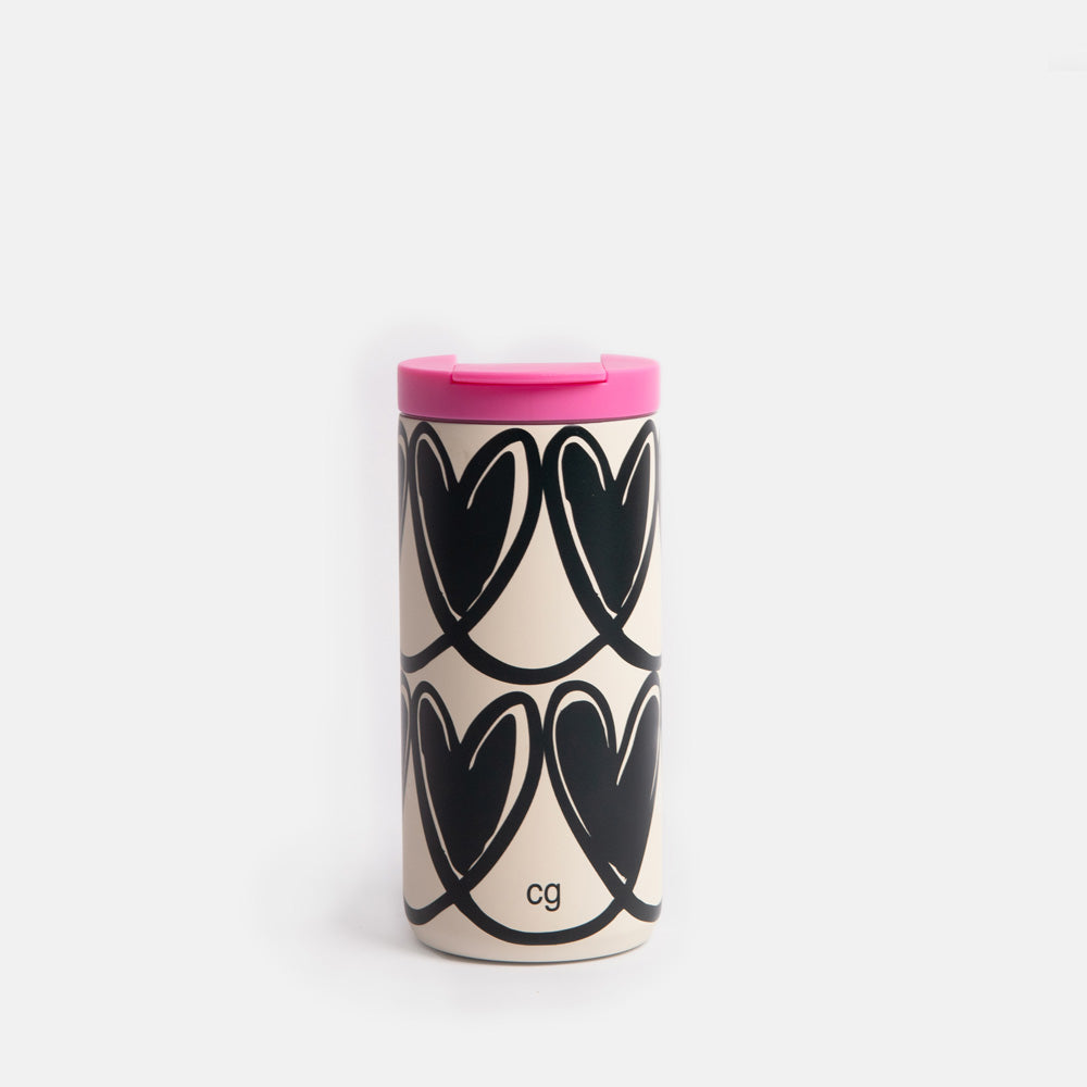 Travel mug with black heart pattern and pink lid on a white background