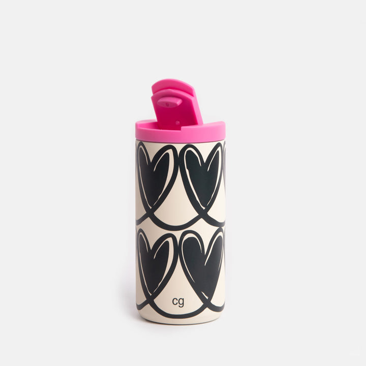 Travel mug with black heart pattern and pink lid on a white background