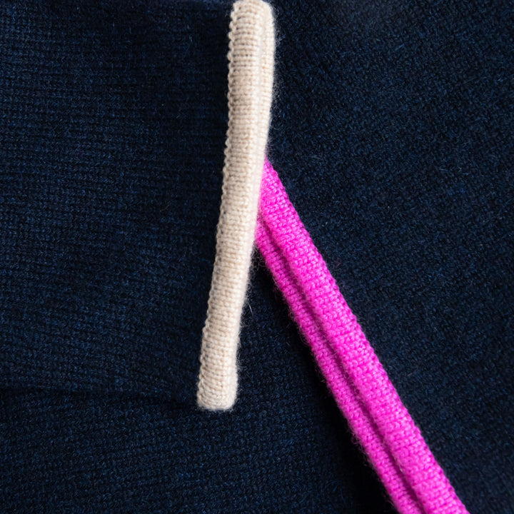 Navy Blue Pure Cashmere funnel neck Jumper with bright pink trim at the waist and camel trim at the wrist, made by Cocoa Cashmere