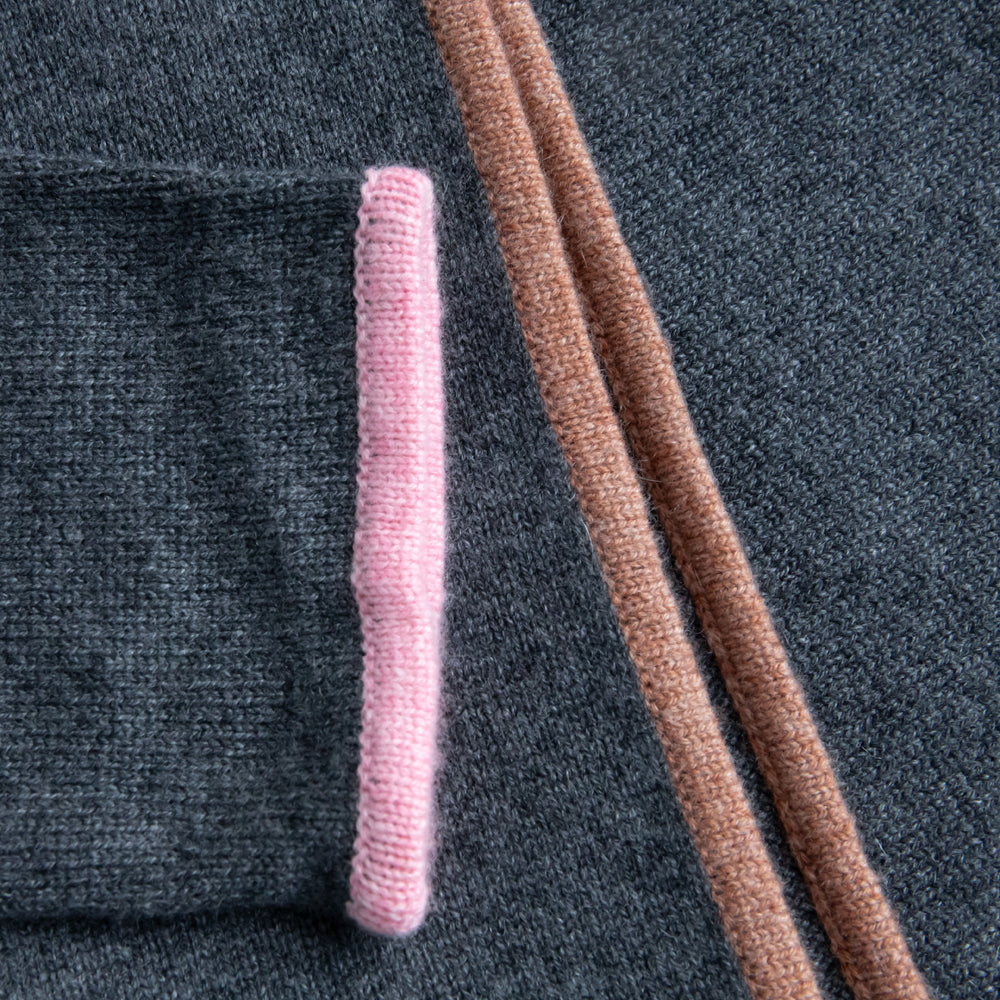 ash grey pure cashmere jumper with pink cuff trim and brown waist trim, made by Cocoa Cashmere