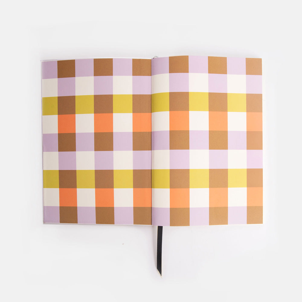Journal inside covers with a checked design in pastel colours on a white background