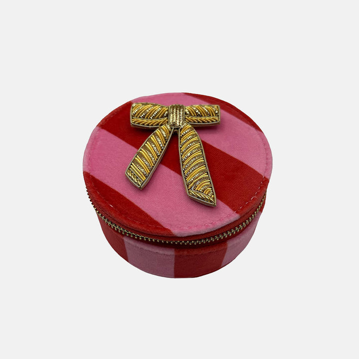 pink stripe velvet travel jewellery box with gold bow brooch 