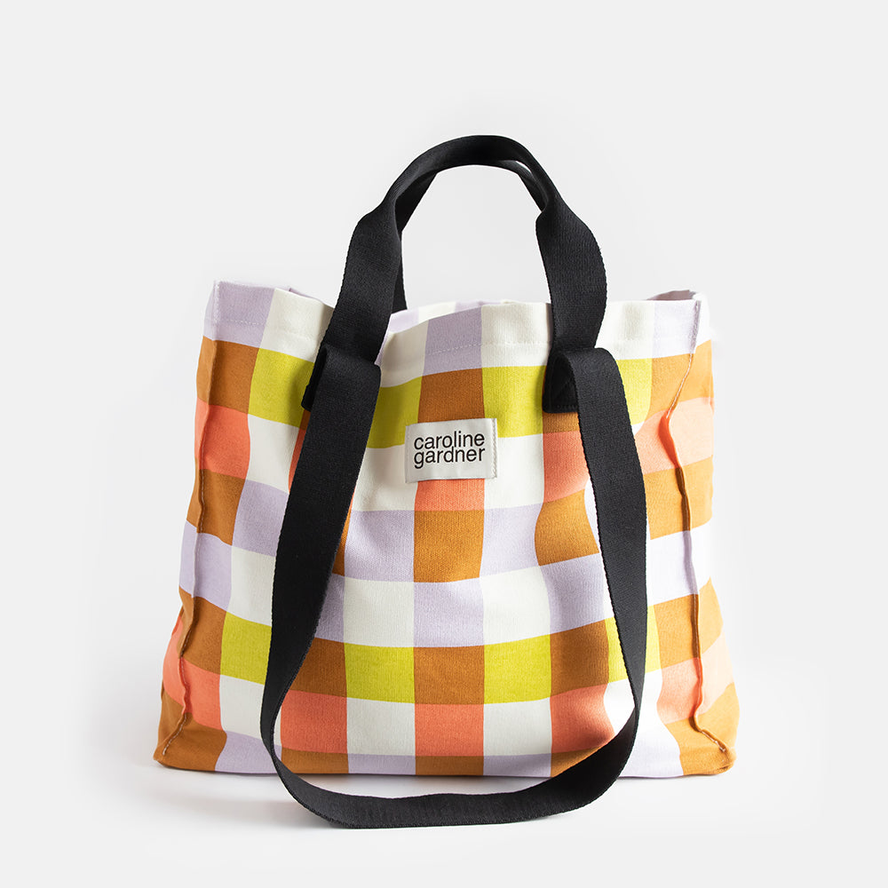 large cotton canvas tote or shopper bag in multi coloured check print with grab and shoulder straps