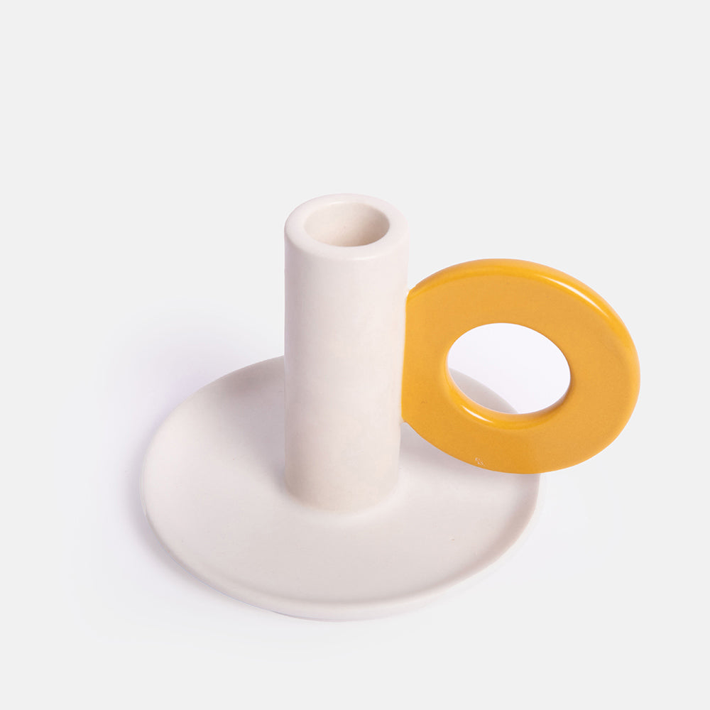 cream glazed stoneware candle holder with mustard yellow loop handle