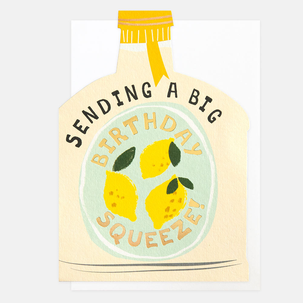 birthday card cut out in a bottle shape featuring lemons and 'sending a big birthday squeeze' message