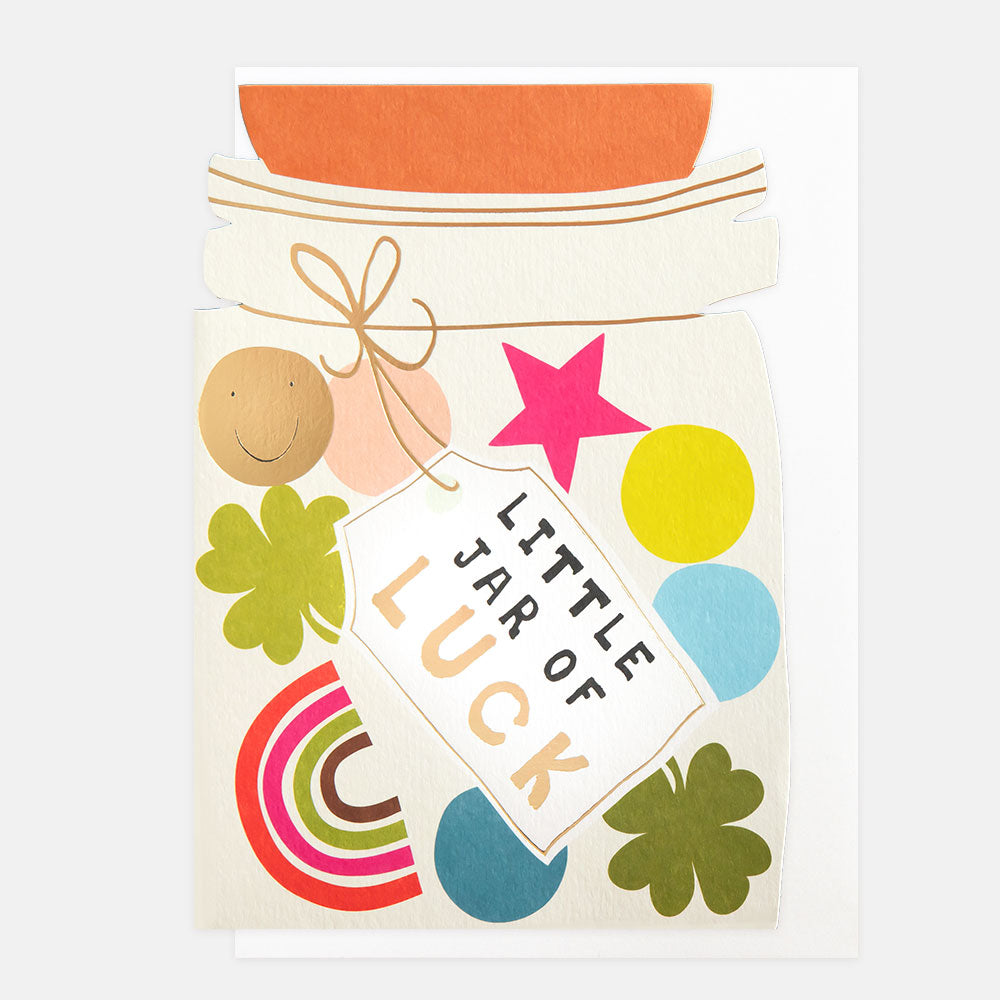 greeting card cut out in a jar shape featuring colourful shapes and 'little jar of luck' message