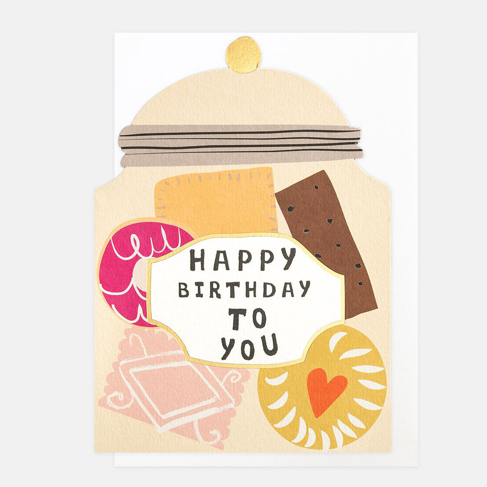 birthday card cut out in a biscuit jar shape featuring biscuits and 'happy birthday to you' message
