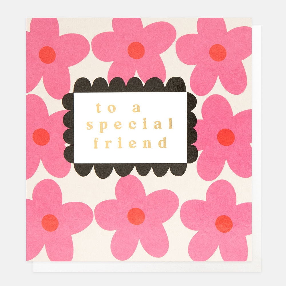 greeting card featuring pink flowers and 'to a special friend' message in gold foil