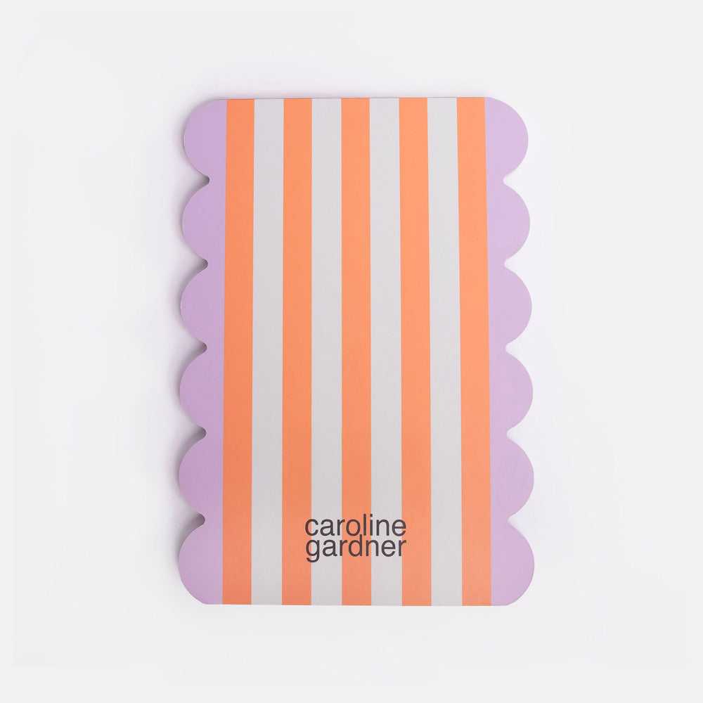back of list pad with orange stripe design and lilac scallop edge