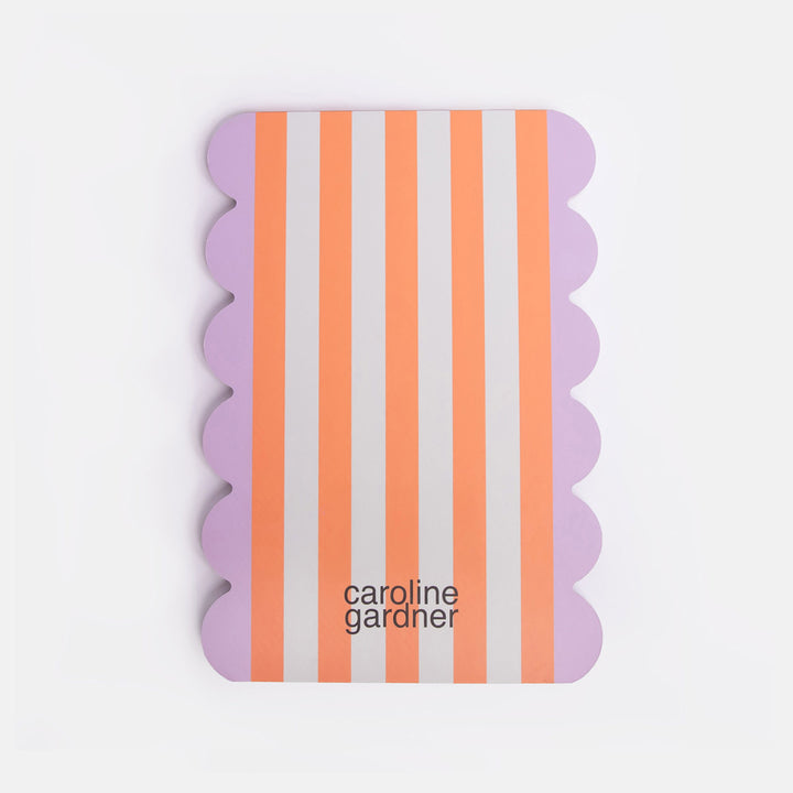 back of list pad with orange stripe design and lilac scallop edge