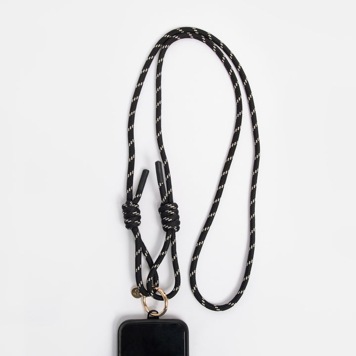 black & white cord long crossbody phone strap with gold o-ring and universal phone case adapter