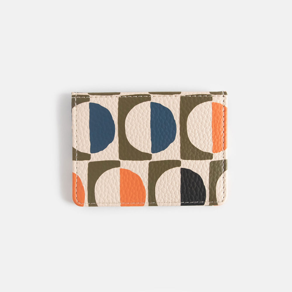 leather look card holder wallet in retro geometric circles design in orange, green, white & blue