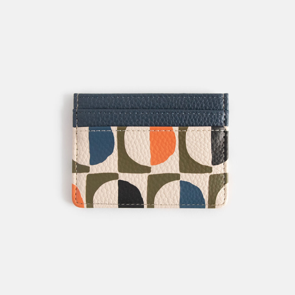 leather look card holder wallet in retro geometric circles design in orange, green, white & blue