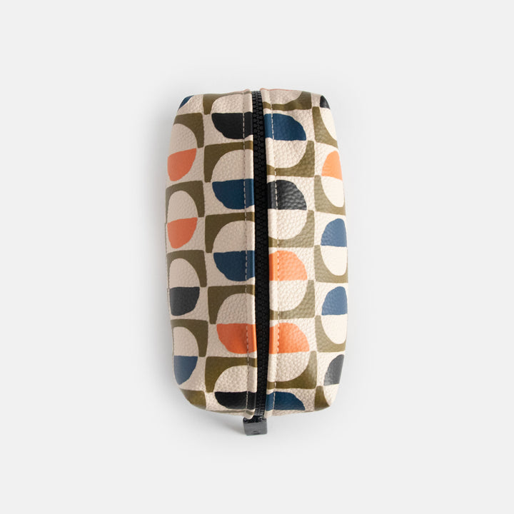 vegan leather look wash bag in green, blue, white & orange retro geometric circles print