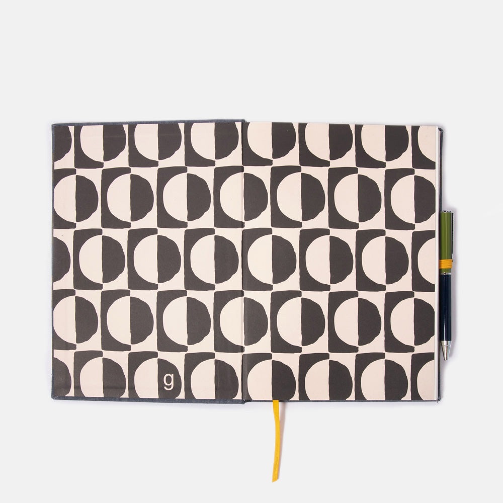 Notebook inside cover page with geometric pattern on a white background