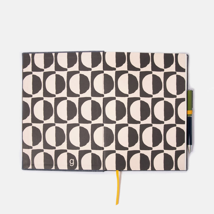 Notebook inside cover page with geometric pattern on a white background