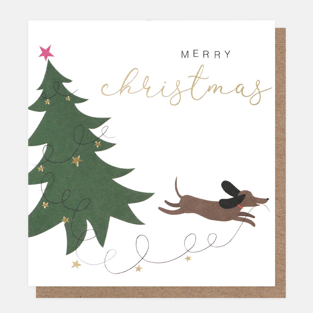 sausage dog and Christmas tree charity Christmas card with brown kraft envelope. 