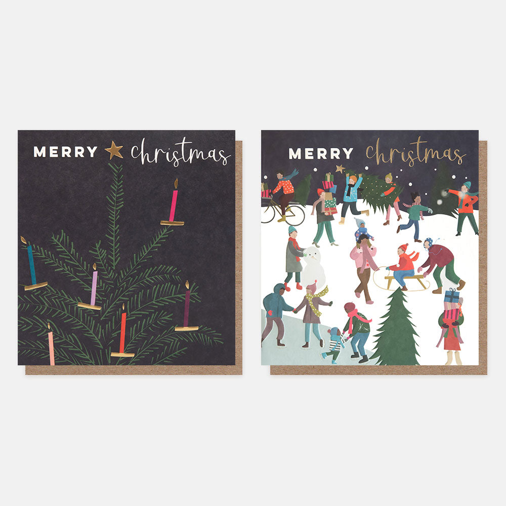 two Christmas card design, one with a fir tree with colourful candles and gold star, and the other with a winter night time scene of people playing in the snow