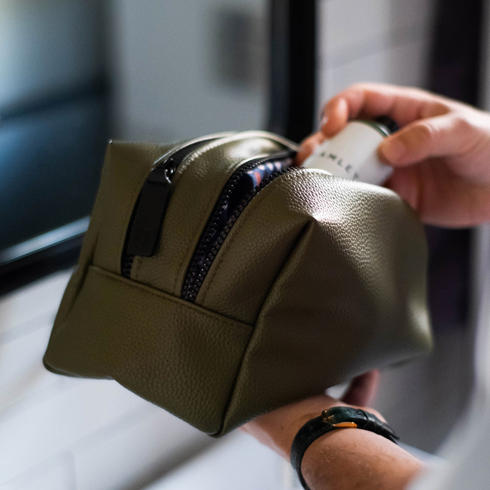 green leather look large travel washbag with double zip opening