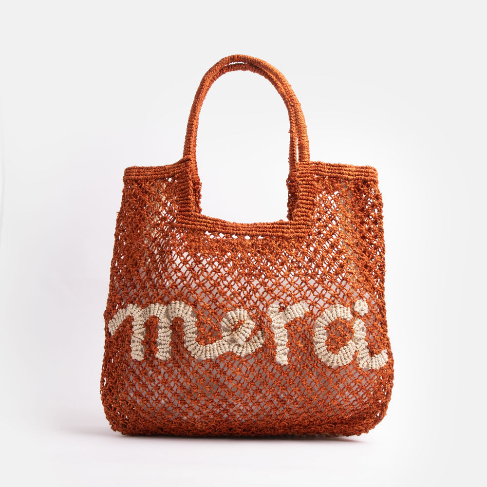 dark orange 'merci' slogan jute shopper bag