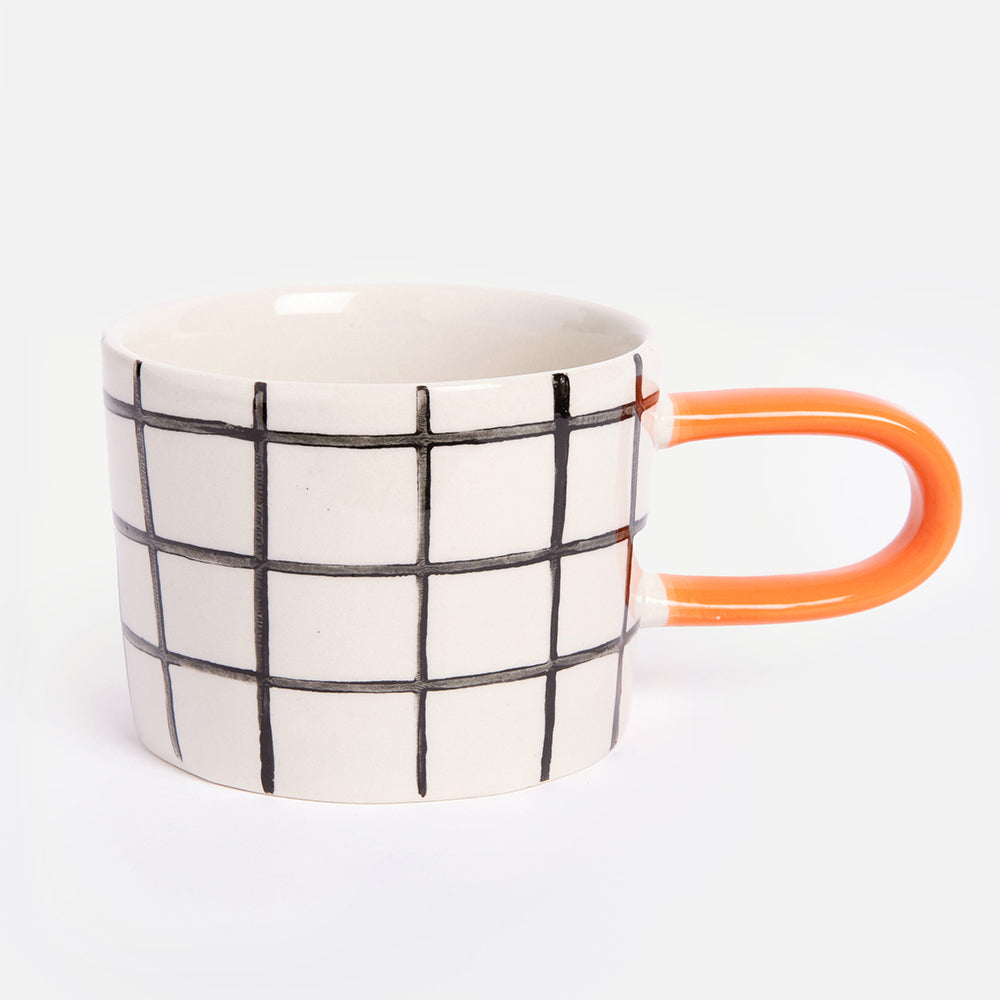 monochrome grid check stoneware ceramic mug with orange handle