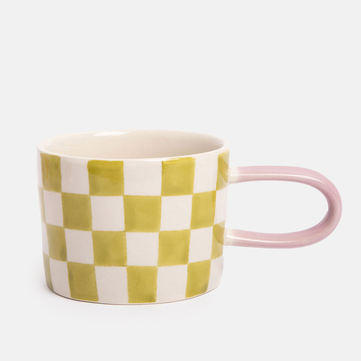 hand painted ceramic stoneware mug with green check design and pale pink elongated handle